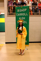 Graduation Posed in front of Banner